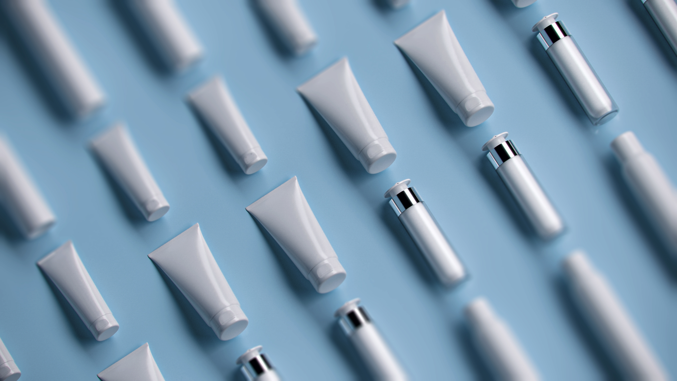 3D Render of various cosmetic containers in a grid